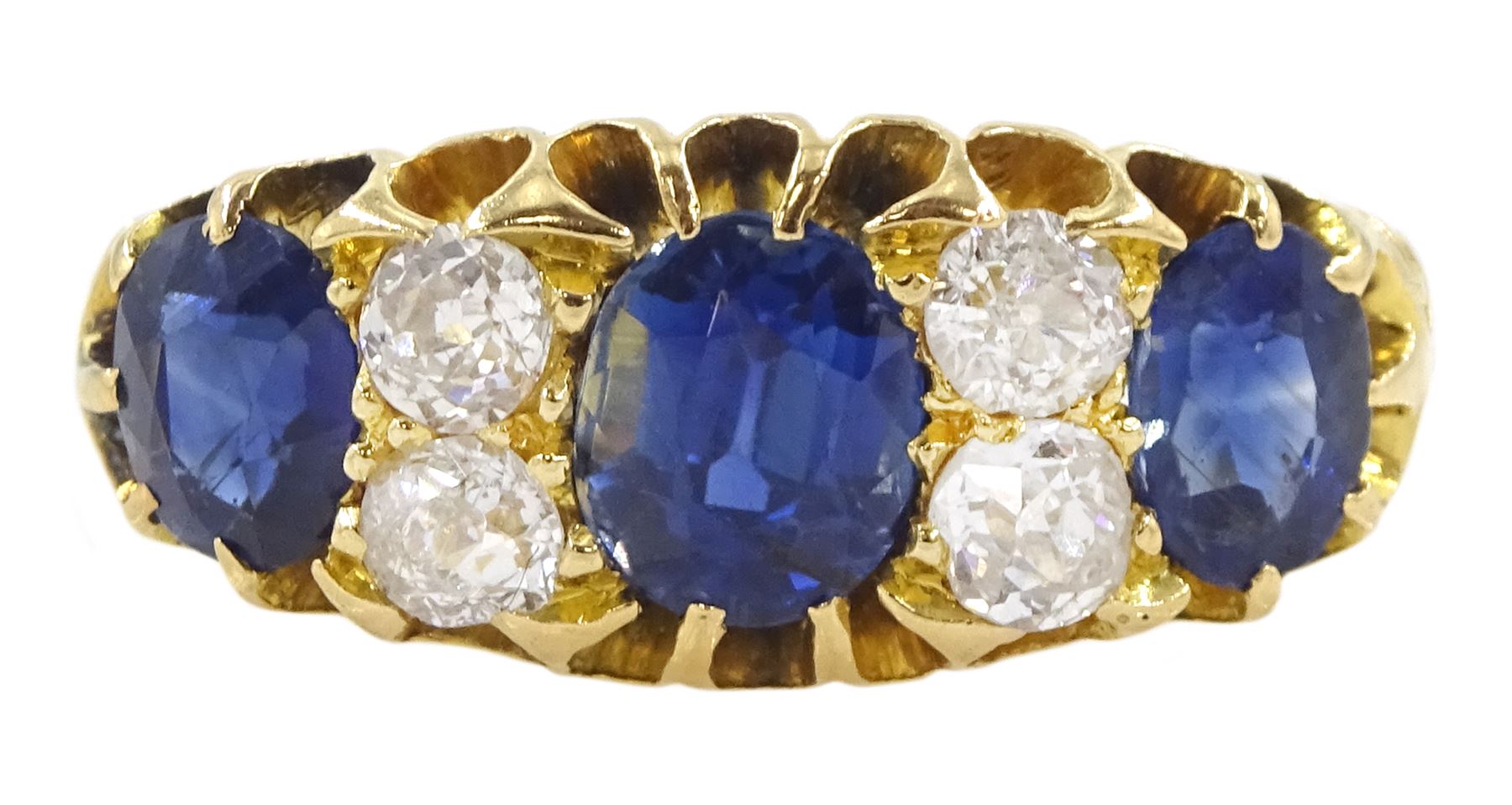 Victorian 18ct gold three stone oval cut sapphire and four stone old cut diamond ring, Chester 1898, total sapphire weight approx 1.70 carat, total diamond weight approx 0.40 carat