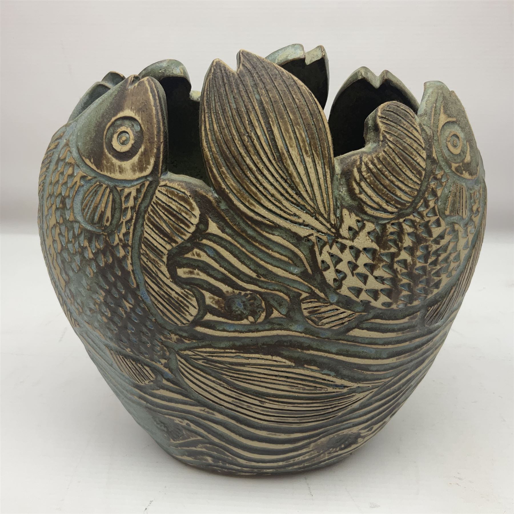 John Egerton (c1945-): studio pottery stoneware vase, decorated with fish and ammonites, H24cm