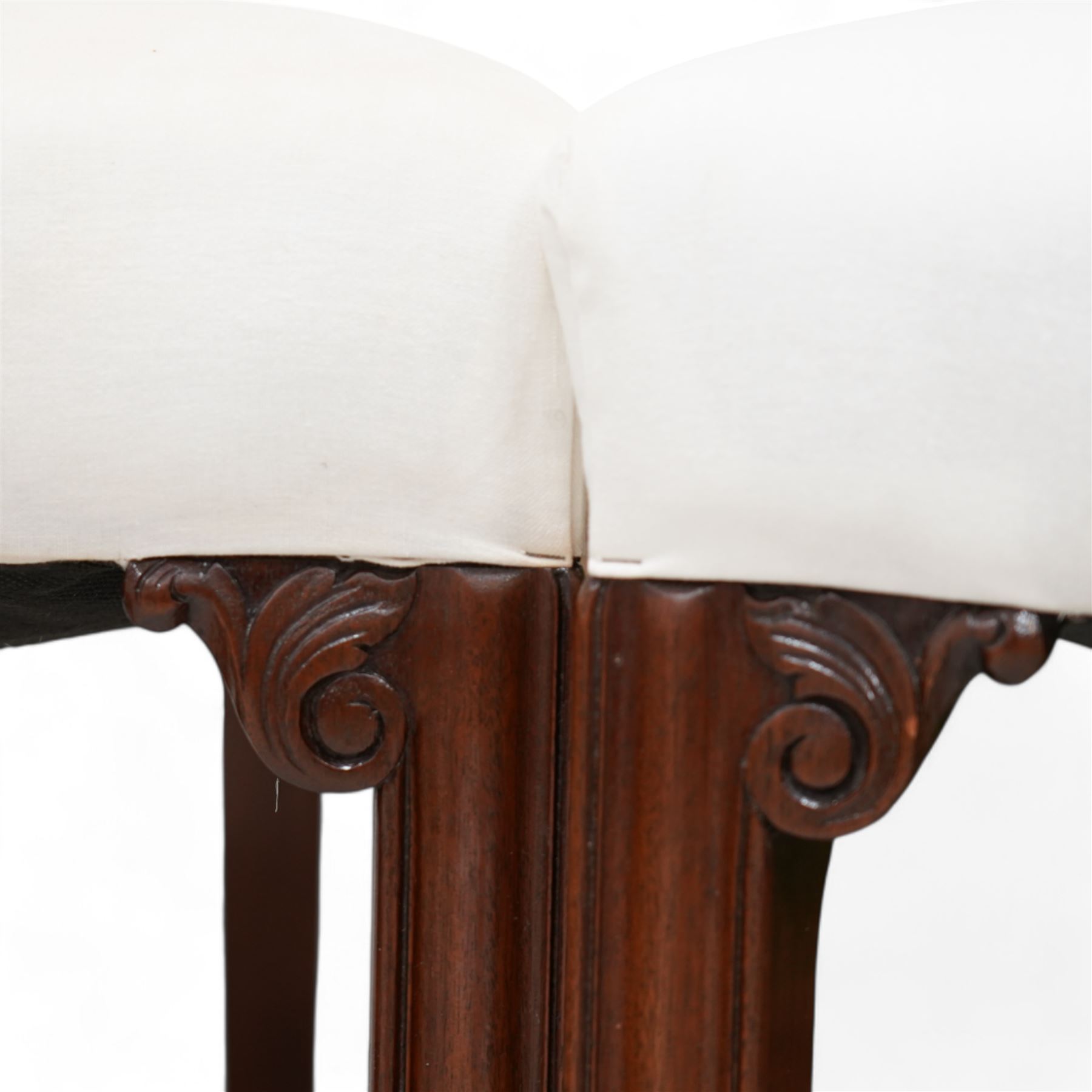 Set of six Georgian design mahogany framed dining chairs, upholstered in calico cover, on moulded square supports with foliate scroll carved brackets 