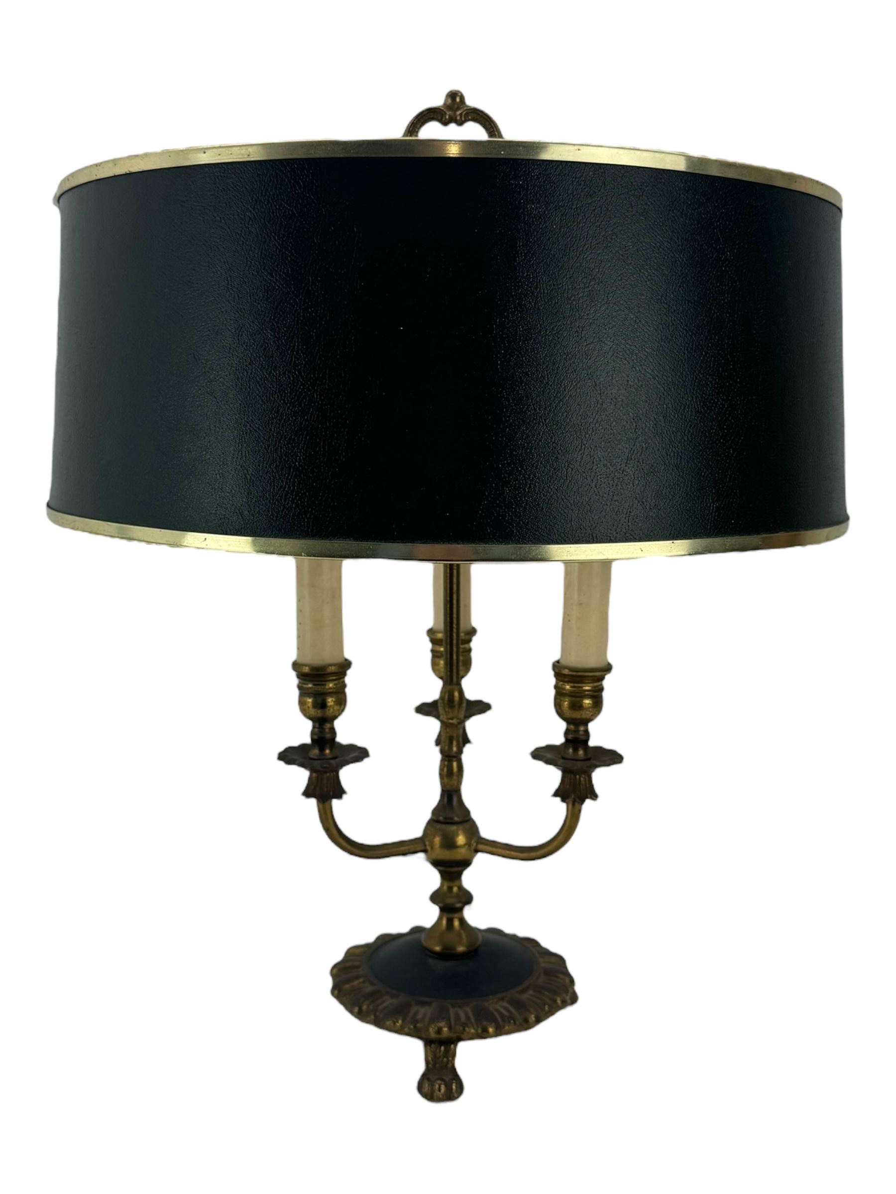 Italian mid century wheatsheaf design gilt and lacquer table lamp, on circular base with shade, H74cm overall, a three branch table lamp modelled as a candelabra, and one other table lamp (3)