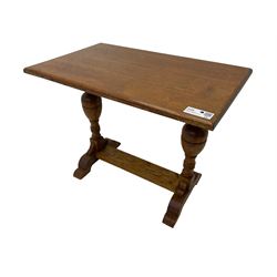 20th century oak occasional table, rectangular top on turned twin pillar supports, carved with squirrel motif, on shaped sledge feet united by stretcher 