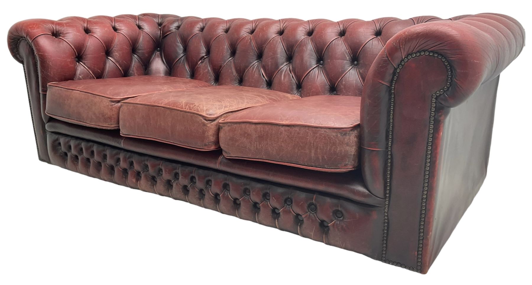 Chesterfield three-seat sofa upholstered in red buttoned leather