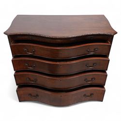 Early 20th century Chippendale design mahogany serpentine chest, shaped moulded top carved with repeating flower head motifs, fitted with brushing slide over four graduating cock-beaded drawers, pierced and foliate moulded handle plates with scrolled swan neck handles, canted upright corners carved with flower heads and strapwork, on canted ogee bracket feet