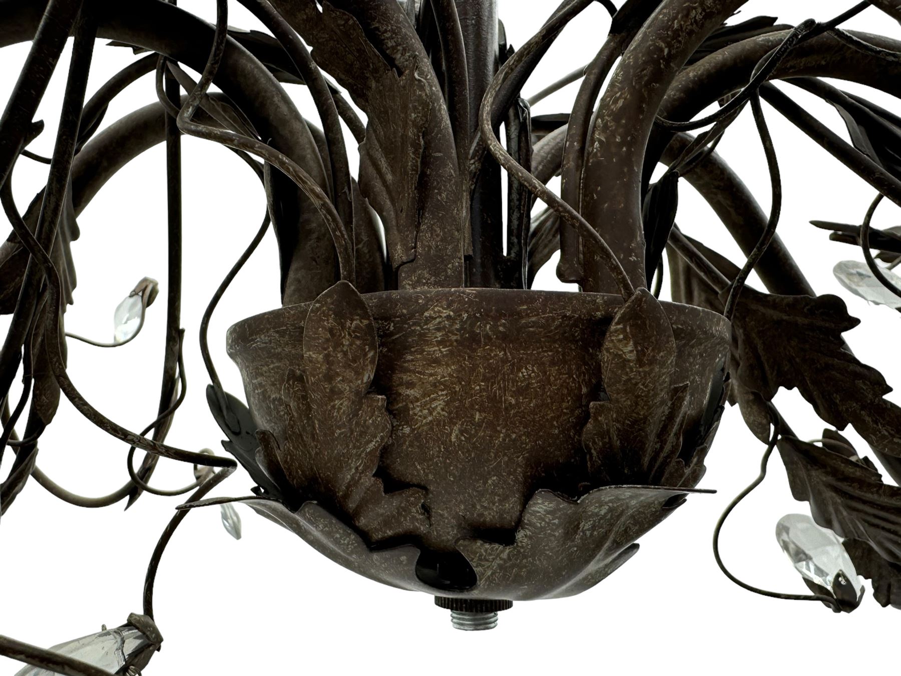 India Jane Interiors - contemporary wrought iron chandelier, adorned with vine and leaf motifs intertwined with faceted glass crystal drops, curved arms supporting six candle-style light fittings, the central stem terminating in a suspension loop