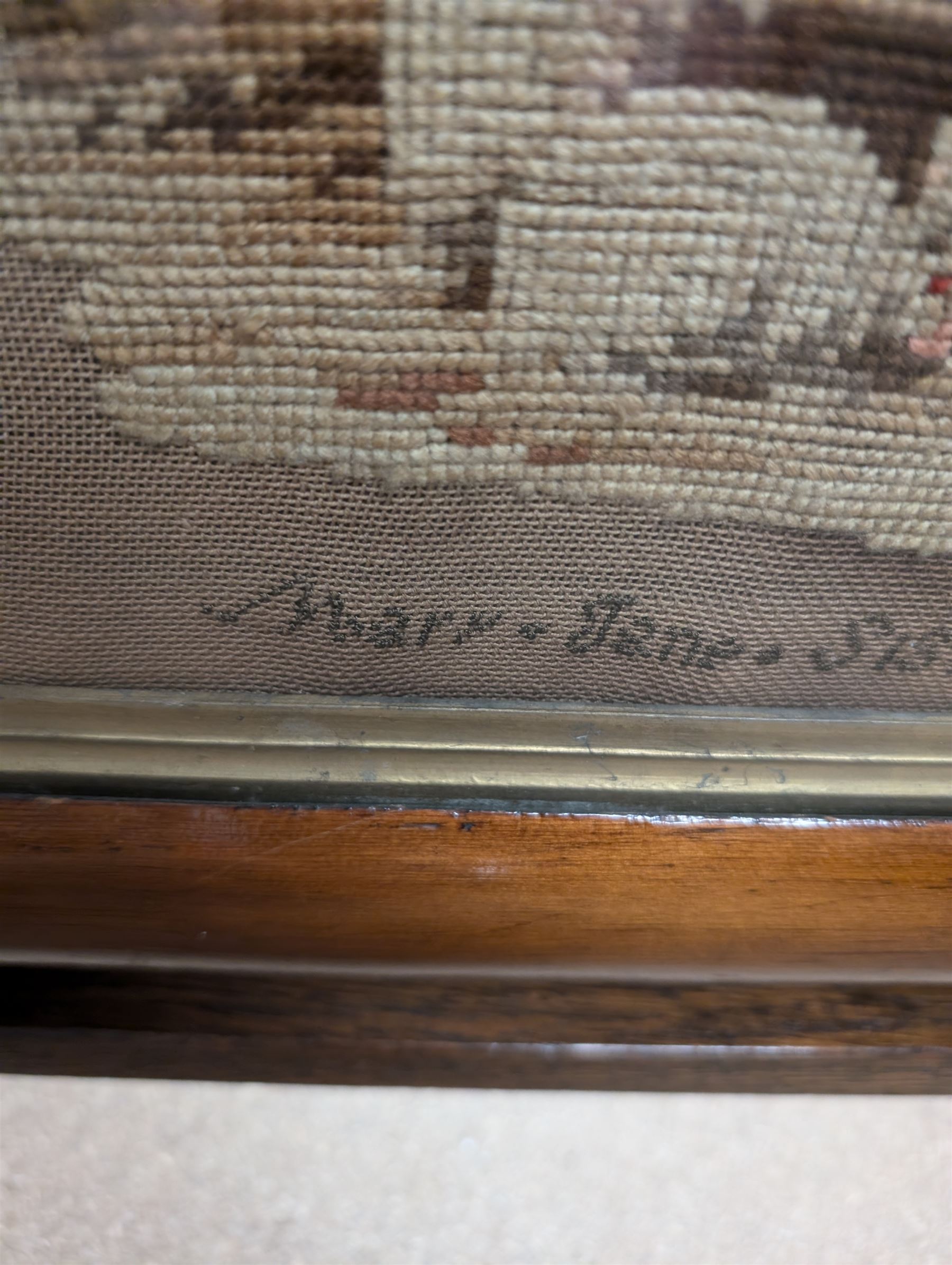 Victorian sampler, depicting woman and young child feeding rabbits, worked by Mary Ann Siswick 1849, set within an oak fire screen, fire screen H75.5cm