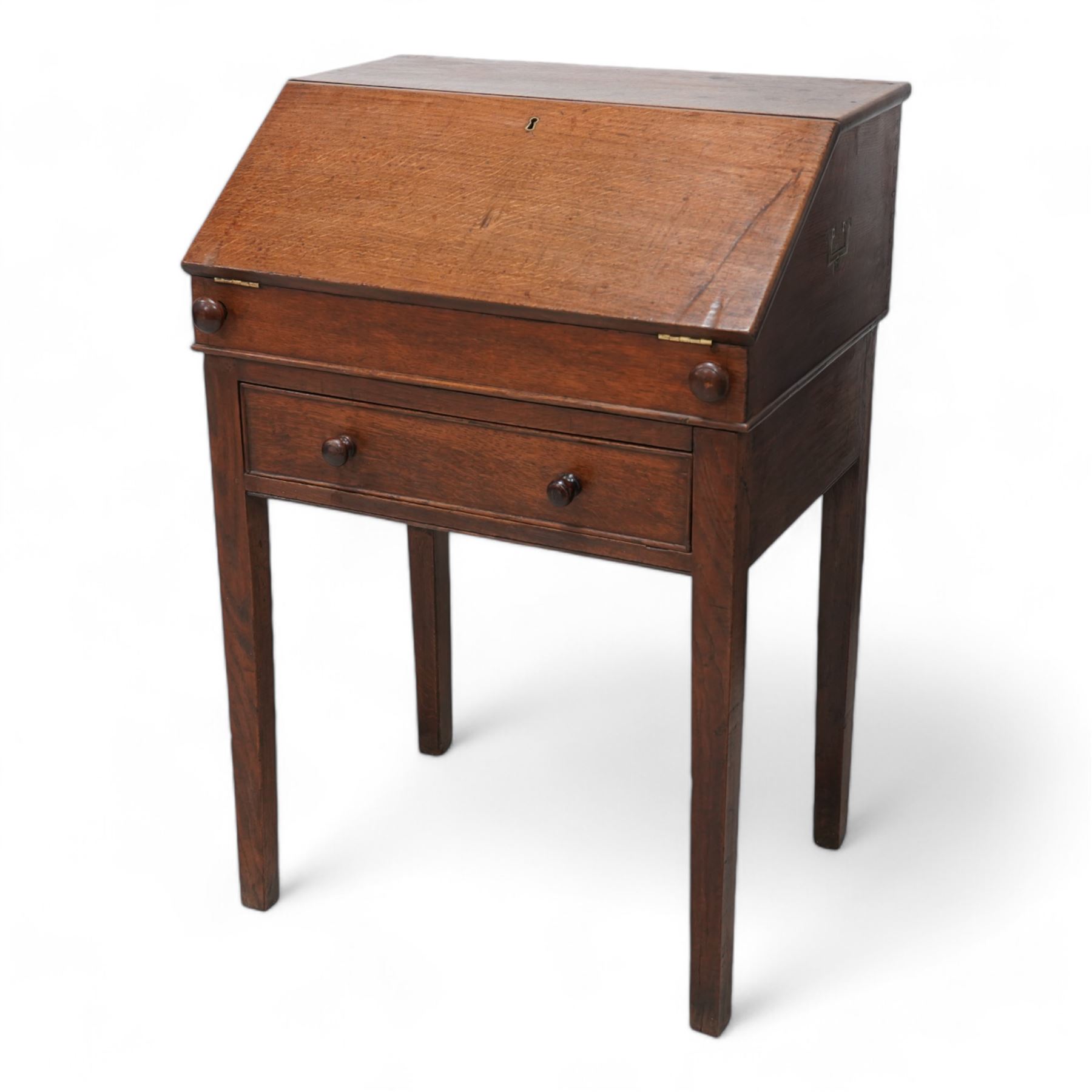 18th century oak campaign bureau, the removable top section enclosed by sloped lid, with fitted interior and carrying handles, on stand fitted with single drawer on square tapering supports