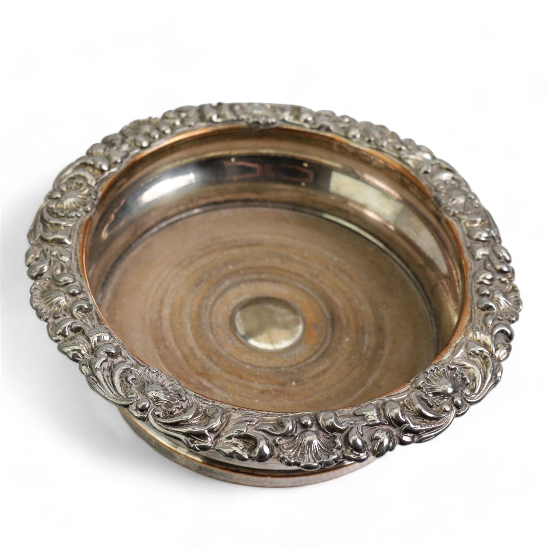 Large 19th century silver plate on copper circular table centre bowl, repousse with tavern scenes, D37.5cm, together with two pairs of silver plate on copper bottle coasters 