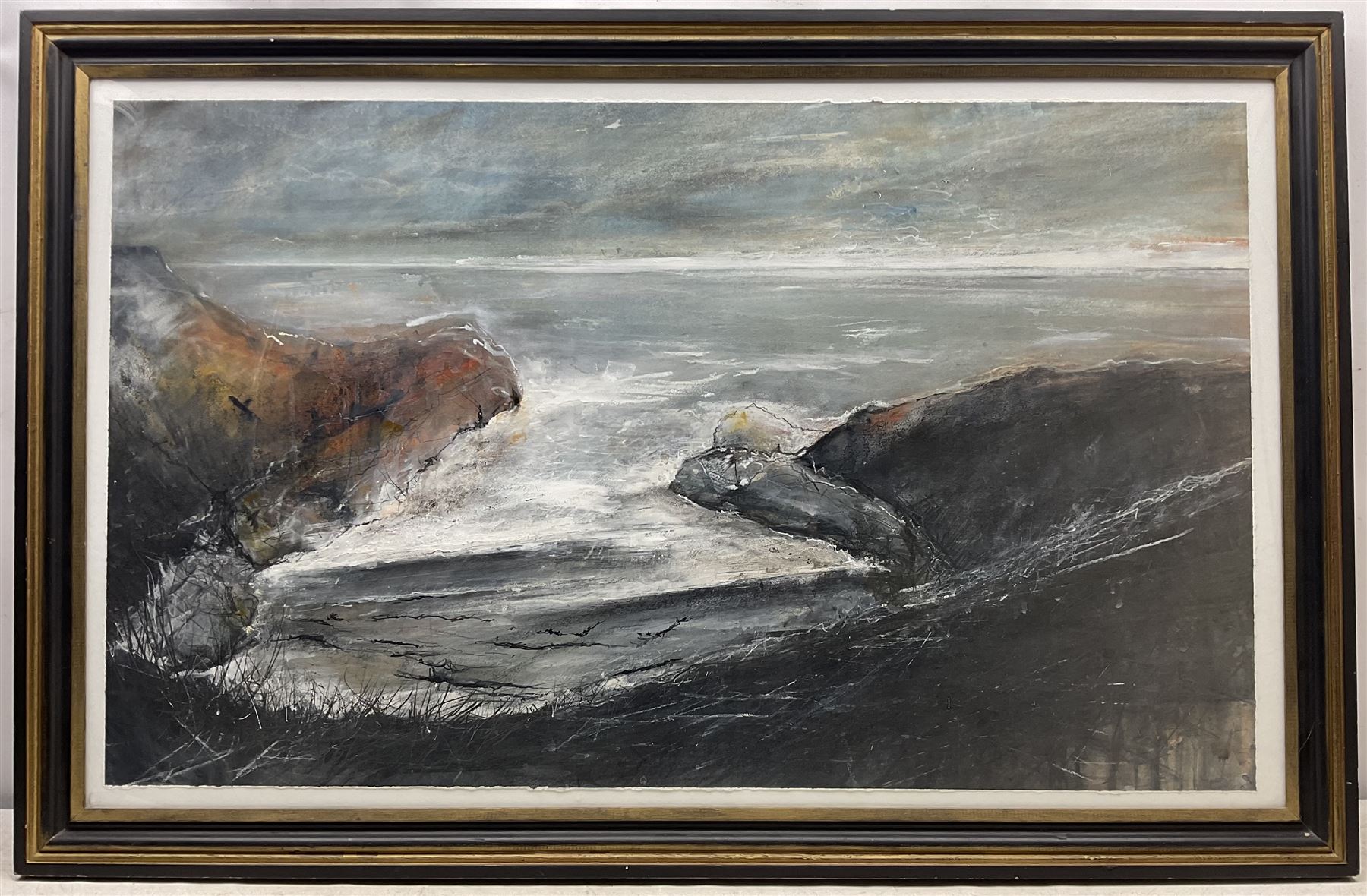 David Baumforth (British 1945-): 'Seagulls Hovering over Little Thornwick Bay Flamborough', mixed media on paper, signed titled and dated '96 on label verso 68cm x 113cm 
Provenance: with Walker Galleries, Harrogate, exhibition label verso