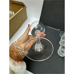 Twelve Villeroy & Boch Octavie glasses, to include six red wine glasses and six tumblers, each glass with hobnail cut decoration, together with a pair of Villeroy & Boch faceted glass candlesticks