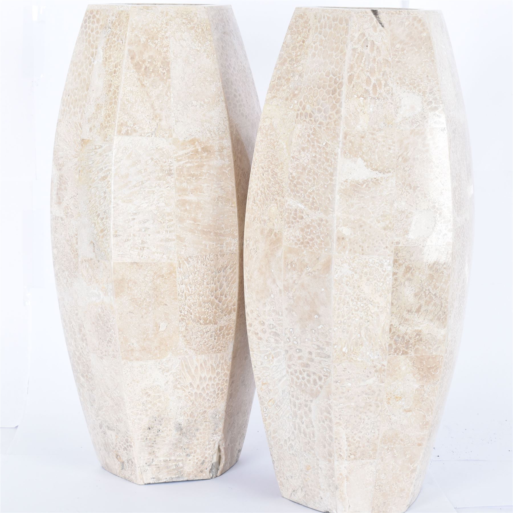 Pair of fossilised coral mosaic vases, of hexagonal form, H46cm