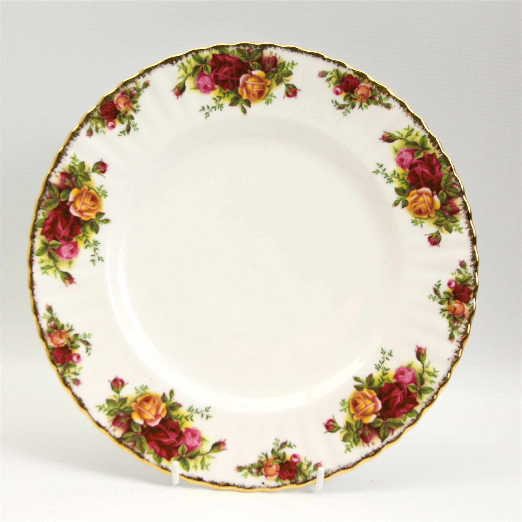 Royal Albert Old Country Roses dinner and tea ware comprising seven dinner plates, eight soup bowls, eight dessert bowls, teacups, saucers and tea plates, two sauce boats and stands, salt & pepper pots, milk jug, sugar bowl, rectangular dish, sandwich plate and oval platter 