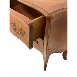 Late 20th century French design walnut bombe chest, shaped moulded top with quarter-matched veneers within crossbanding, fitted with two drawers with foliate cast metal handles and escutcheons, on tapering supports with ornate cast caps 