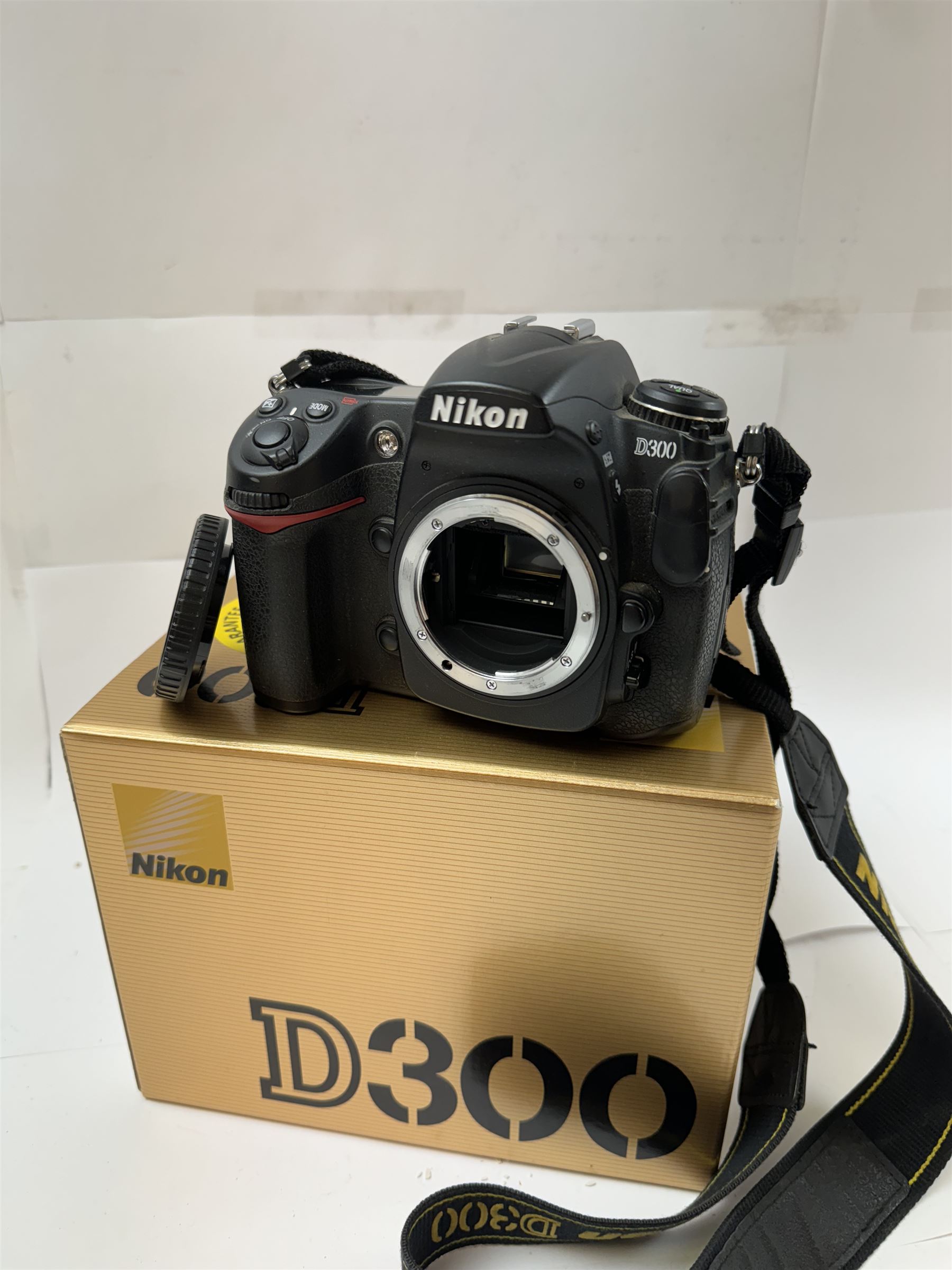 Nikon D300 camera body serial no. 4105777, boxed with shoulder strap, instructions, charger, etc