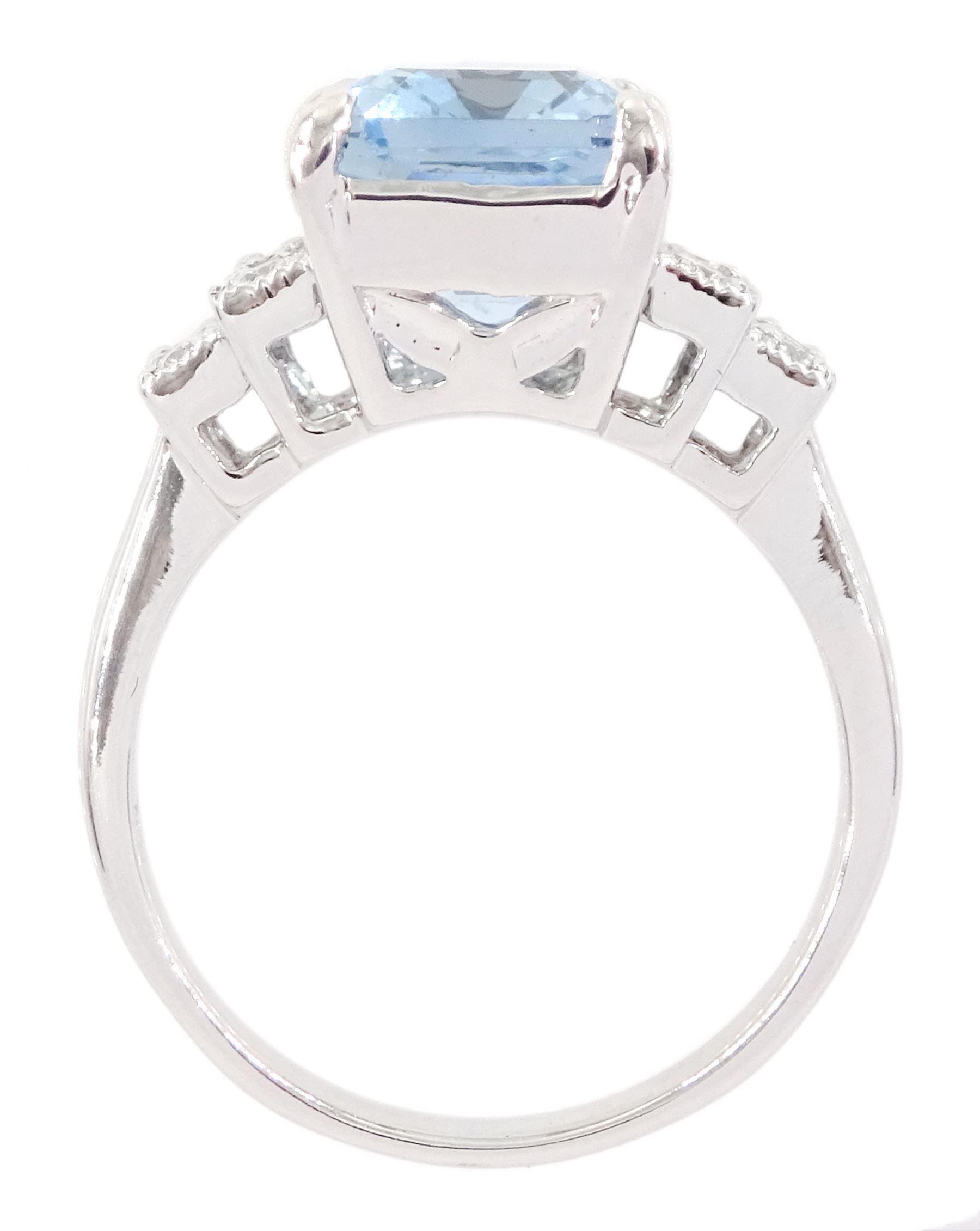 18ct white gold emerald cut aquamarine ring, with stepped design round brilliant cut diamond shoulders, stamped 750, aquamarine approx 4.90 carat, total diamond weight approx 0.30 carat