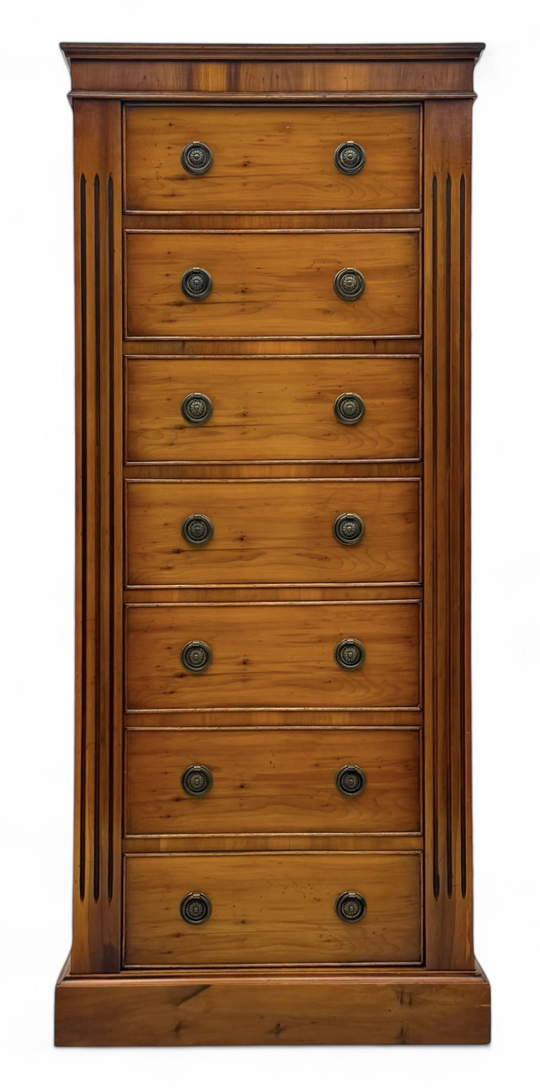 21st century steel lined gun cabinet, modelled as a Wellington chest of yew wood, to hold six long guns, interior lined with green baize, three storage shelves, with keys and bolts 