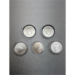 United States of America 1922 one dollar coin, two one ounce fine silver dollars dated 1992, 1996 and two Queen Elizabeth II Australia one ounce fine silver dollars dated 1994, 1995