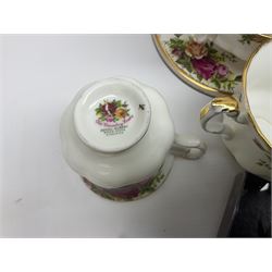 Royal Albert Old Country Roses pattern coffee service for six, comprising coffee pot, milk jug, cups and saucers, cake plate, together with miniature teapot, six teacups and saucers, six dinner plates, six side plates etc 