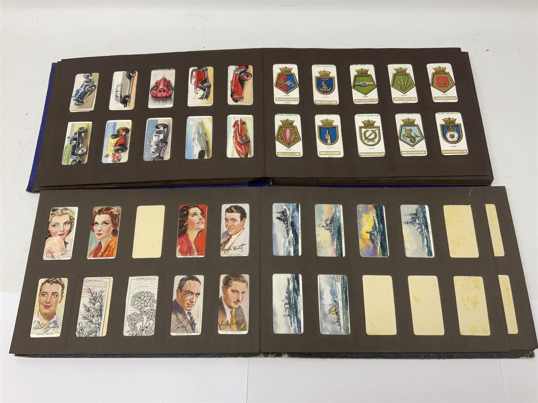 Four albums of cigarette cards, including Will's and Player's examples