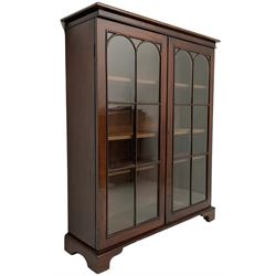 Early 20th century mahogany bookcase, fitted with two astragal glazed doors enclosing three adjustable shelves