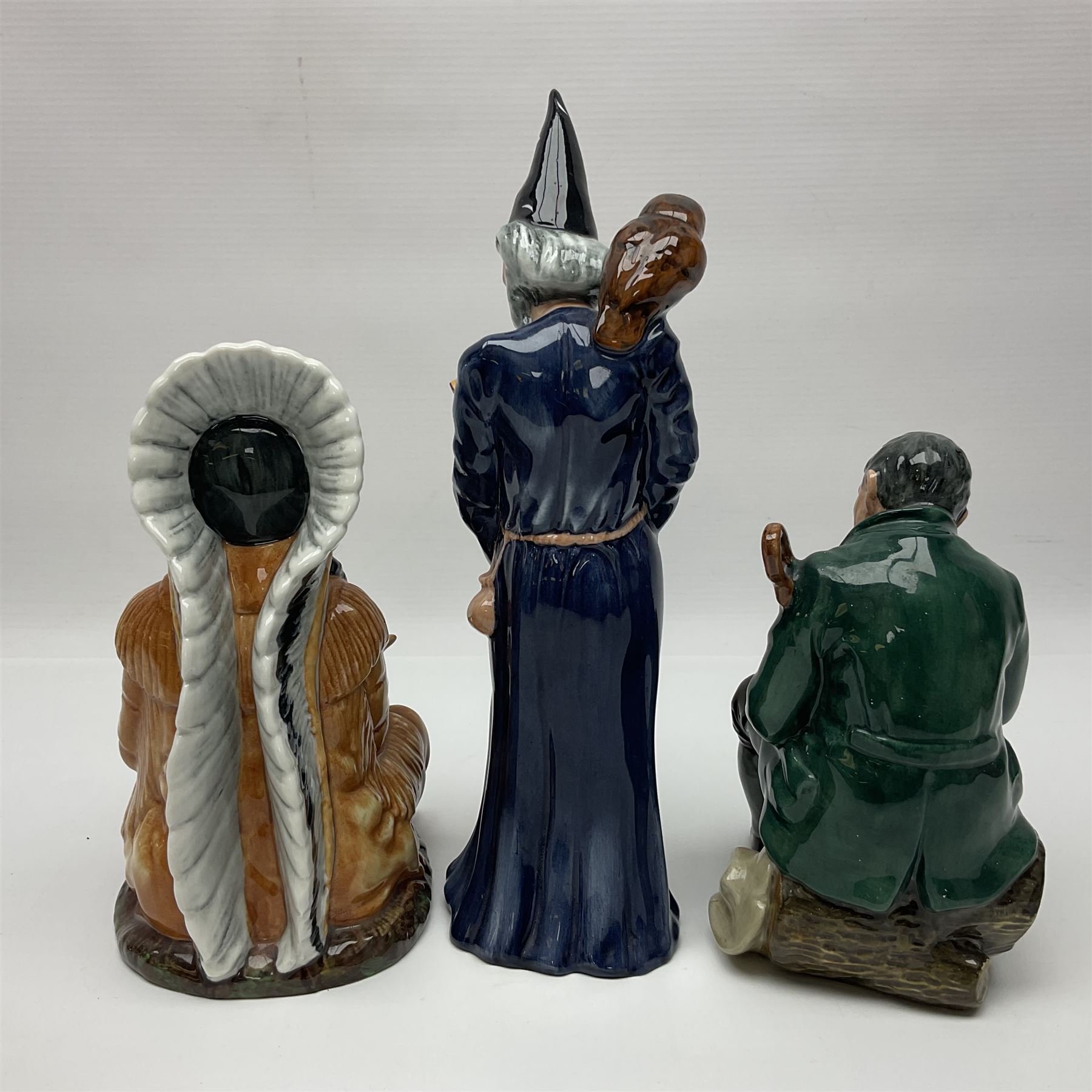 Three Royal Doulton figures, comprising The Wizard HN2877, The Chief HN2892, The Master HN2325