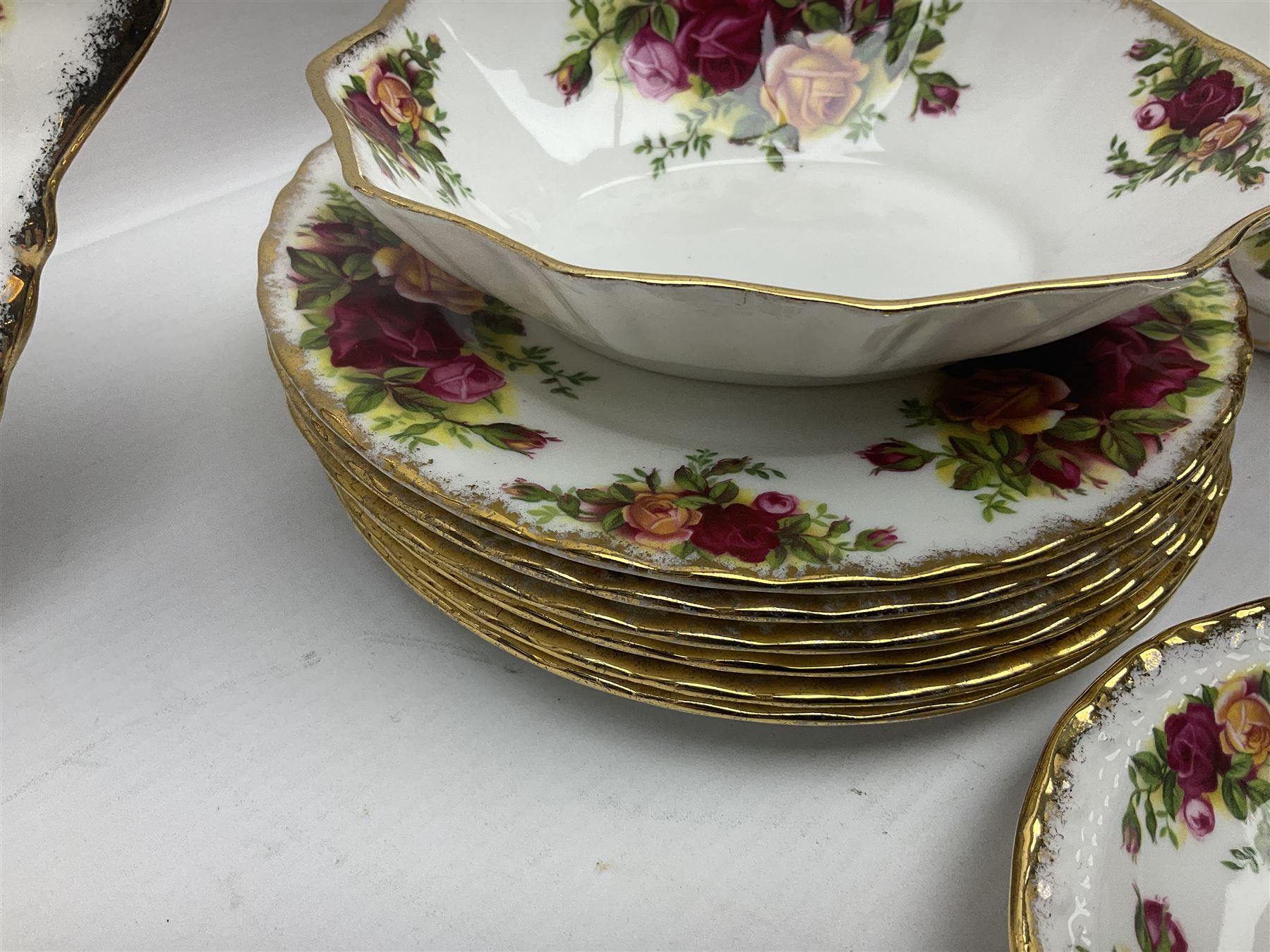 Royal Albert Old Country Roses, tea service for six, comprising teapot, milk jug, open sucrier, teacups and saucers, cake plate, together with other items 