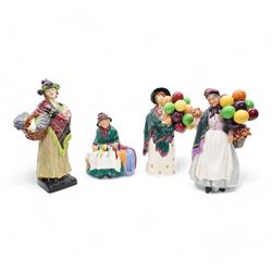 Four Royal Doulton figures comprising 'Sweet Lavender' HN1373, 'The Balloon Seller' HN583,...