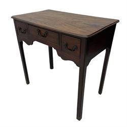 George III mahogany low-boy, moulded rectangular top with rounded front corners, fitted with three cock-beaded drawers, beaded circular brass handle plates and swan neck handles, shaped apron, on square supports with inner chamfer 