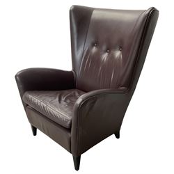 Wing back armchair upholstered in cocoa brown leather