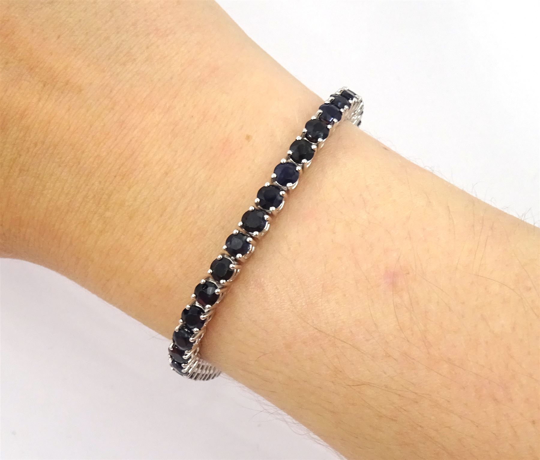 18ct white gold round cut sapphire bracelet, hallmarked, total sapphire weight approx 8.00 carat