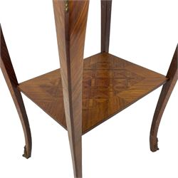 Late 20th century French design Kingwood lamp table, shaped form with geometric parquetry inlaid top within band and raised lip, fitted with single drawer and slide, on cabriole supports united by undertier, decorated with ornate cast gilt metal mounts and terminal caps 