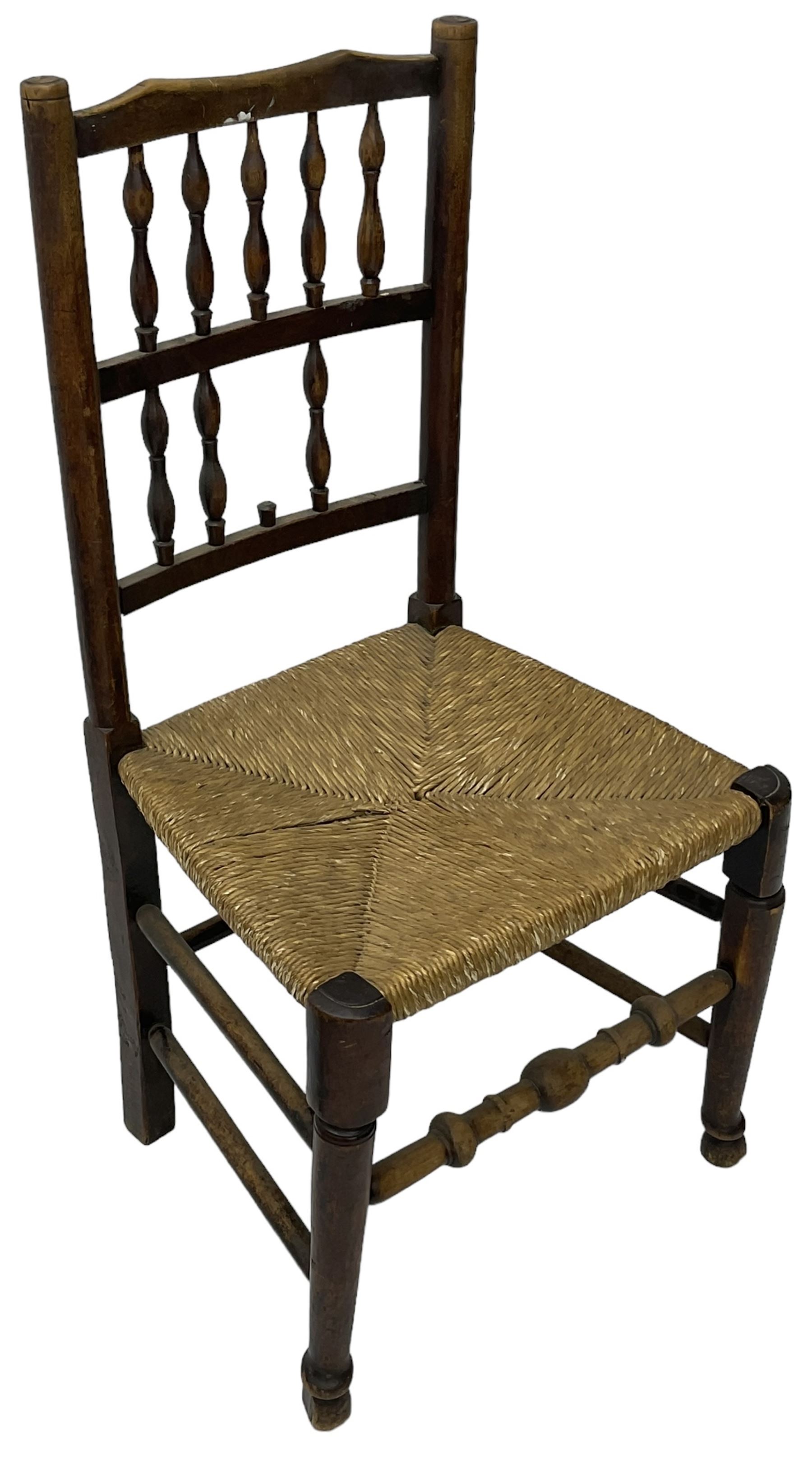 Collection of chairs - five 19th century elm spindle back chairs with rush seats; two chapel chairs (7)