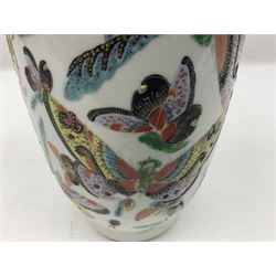 19th century Chinese Canton vase of slender baluster form, decorated with butterflies and floral panel to the neck, H30cm