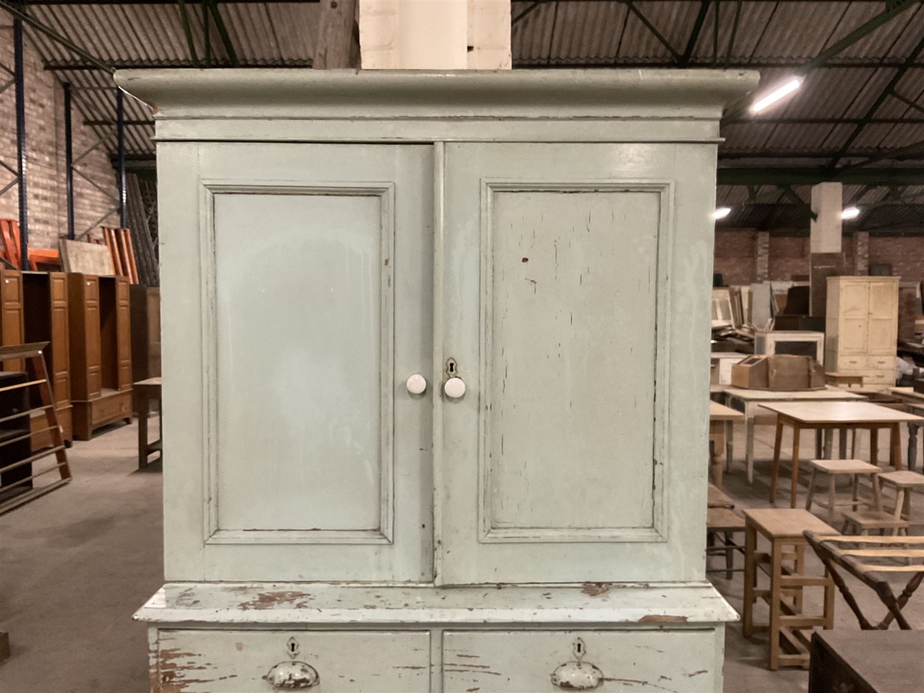 19th century pale blue painted pine housekeepers cupboard, double panelled cupboard enclosing two shelves over two short and three long drawers, on turned feet - THIS LOT IS TO BE COLLECTED BY APPOINTMENT FROM THE OLD BUFFER DEPOT, MELBOURNE PLACE, SOWERBY, THIRSK, YO7 1QY