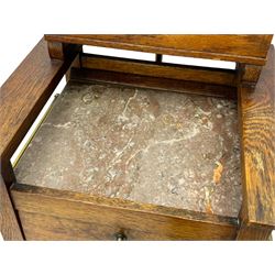 Early 20th century oak vanity stand, with circular adjustable mirror, brass towel rails to the sides, marble inset top and upper compartment, over additional storage compartment with hinged front, on splayed supports with stretchers