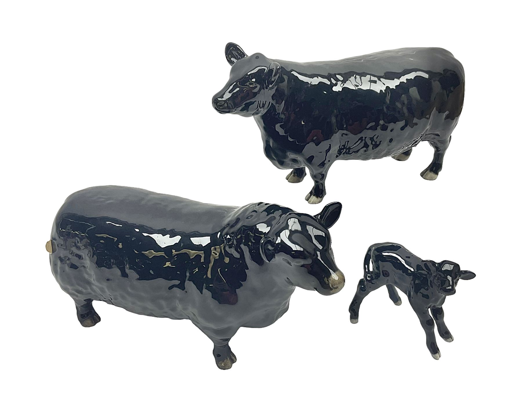 Beswick Aberdeen Angus family group, comprising bull 1562, cow 1563 and calf 1827A