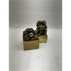 Two contemporary Chinese solid cast brass dragon desk seal, set with turquoise and coral eyes