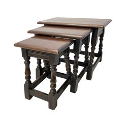 Mid-to-late 20th century medium oak nest of three occasional tables