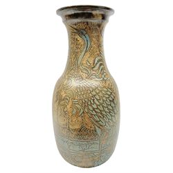 John Egerton (c1945-): studio pottery stoneware vase decorated with cranes in a riverscape upon a mottled brown ground, signed beneath H60cm