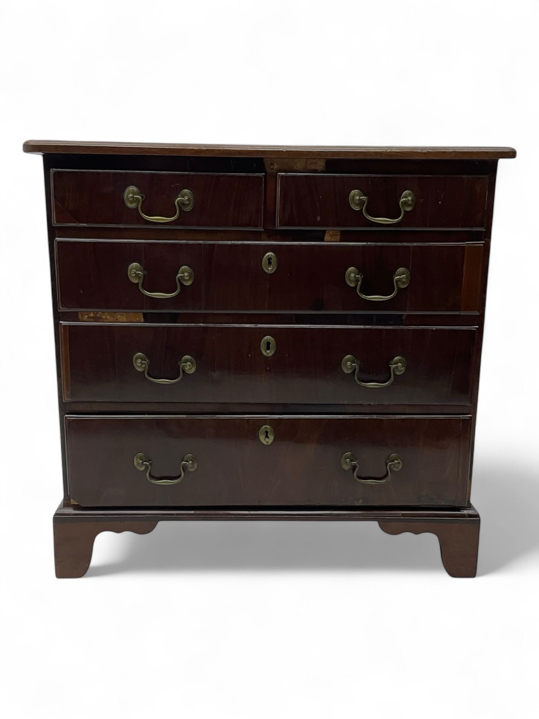 George III mahogany chest, moulded rectangular top over two short and three long drawers, on bracket feet 