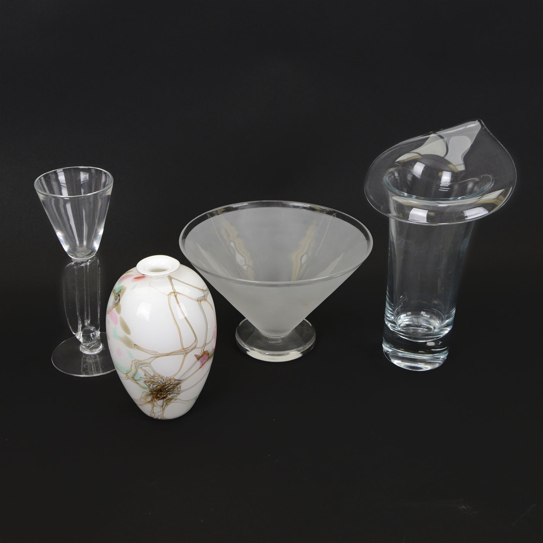 Four art glass vases, comprising a William Walker example, of baluster form, with abstract pink, green and brown decoration upon a white ground, with signature to base, a clear Simon Moore goblet example, a clear Jack in the Pulpit glass vase and a conical footed frosted glass bowl, signed Glassworks, tallest H28cm