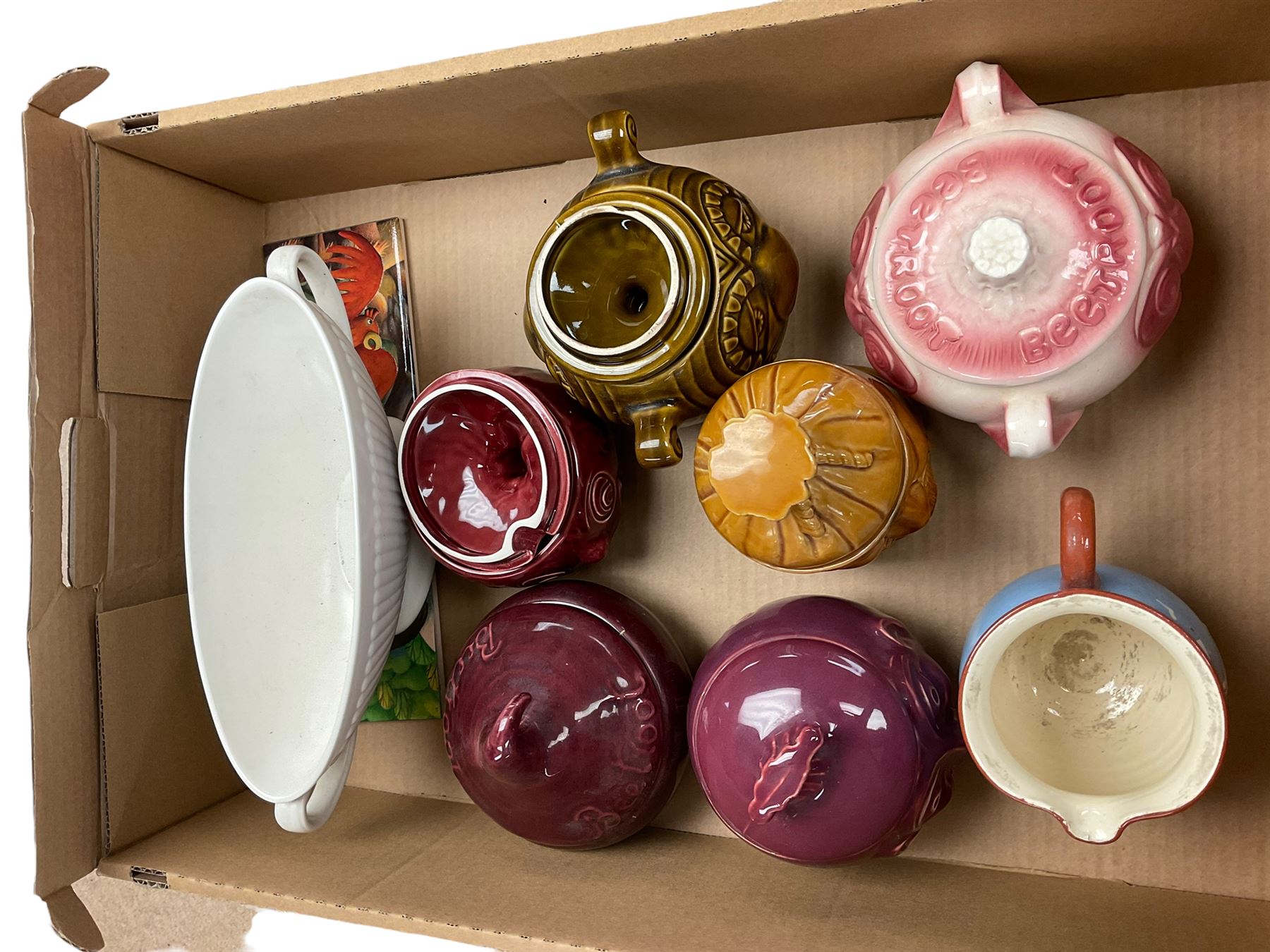 Six British pottery ceramic vegetable shaped condiments jars, including beetroot, onion, tea etc 