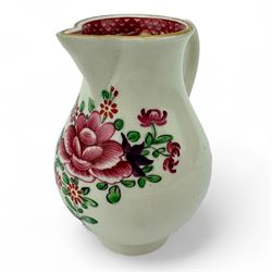 18th century Worcester sparrow beak jug, hand painted in polychrome enamels with floral bouquets and sprig within pink scale borders, with ribbed loop handle, H10cm