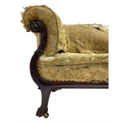 19th century mahogany settee, rolled S-scrolled arms carved with lion masks and acanthus leaf scrolls, the lower moulded rail carved with scrolling design, raised on carved paw feet with recessed brass and ceramic castors 