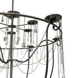 Large bespoke wrought iron cage candle chandelier, the top tier with six extending branches over bell-shape cage with scrolled supports and six branches, six branch lower tier; together with ceiling winch 