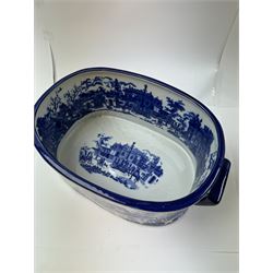 Pair of Victorian style blue and white footbaths, each with twin lug handles and transfer print decorated with city scape, H14cm