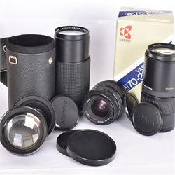 Group of camera lenses, comprising Yashica AF 70-210mm 1:4.5 58mm lens serial no. F6106983, boxed, Yashica AF 35-70mm 1:3.3-4.5 52mm Macro lens serial no. F60231147, Yashikor Aux Wide Angle 1:4 lens and a Yashikor Aux Tele-Photo 1:4 lens, Mamiya-Sekor E 1:2.8 f=28mm serial no. 13427 and a Mamiya-Sekor Zoom E 1:4 f=80-200mm lens serial no. 11271