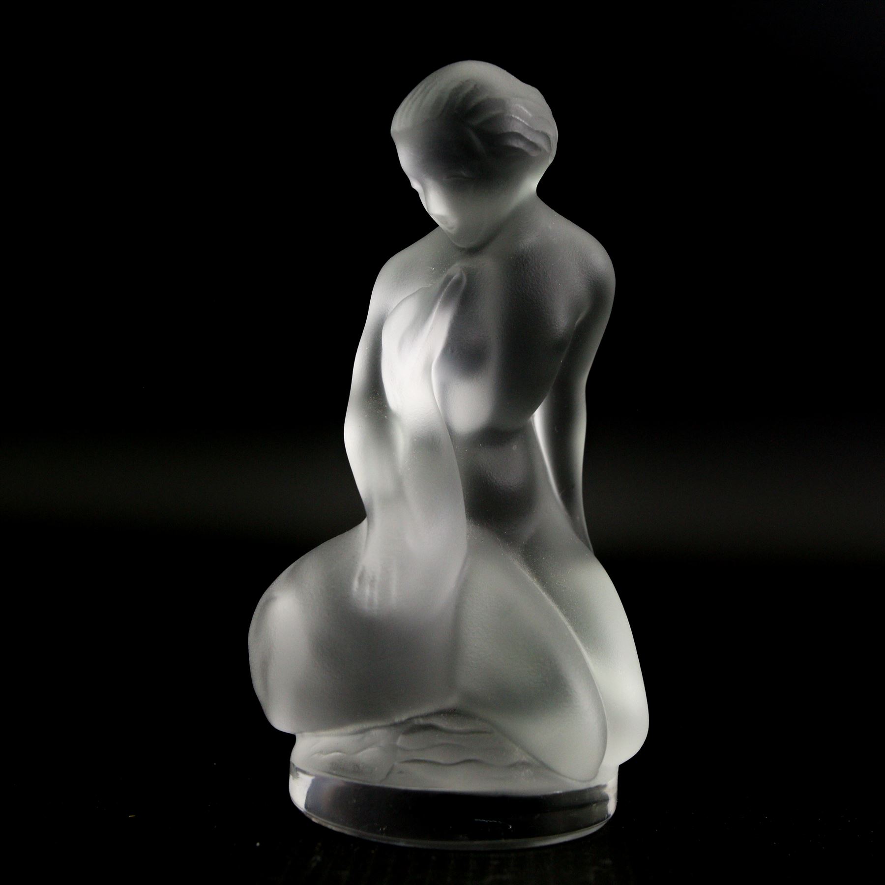 Two Lalique crystal figures modelled as Leda and the Swan and Diane, both signed Lalique, France, H12cm (2)