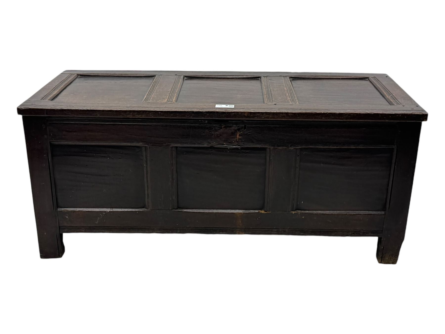 18th century oak blanket box, panelled hinged lid over panelled front, moulded frame, on stile supports 