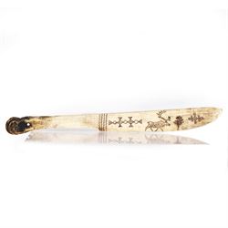 Inuit scrimshaw carved bone scraping knife, decorated with deer and tree, L25cm