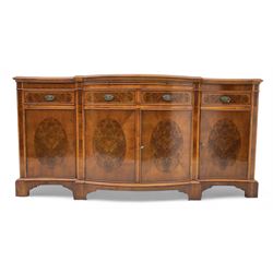 Wade - Georgian design yew wood bow-fronted sideboard, projecting moulded top over four cockbeaded frieze drawers, the central two with pull-out slides, four cupboards below with figured veneers, raised on bracket feet